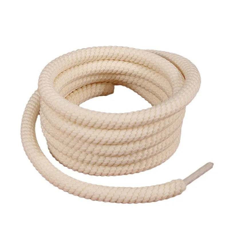 Pair of round woven shoelaces in white next to a ruler showing 10mm diameter and length scale.
