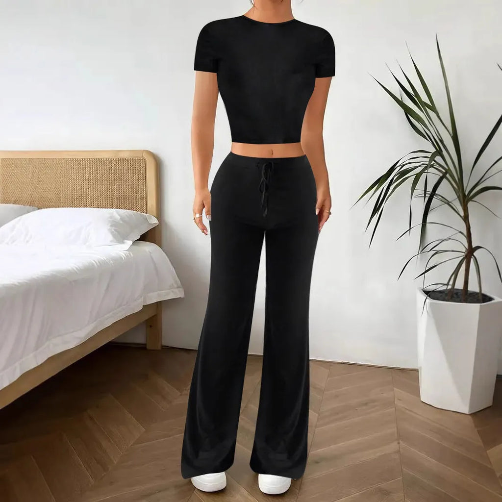 Black high waist polyester trousers with matching short sleeve t-shirt top women's suit set
