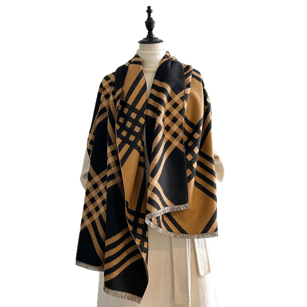 Long brown imitation cashmere scarf with tassels laid flat, showing its 185cm length.