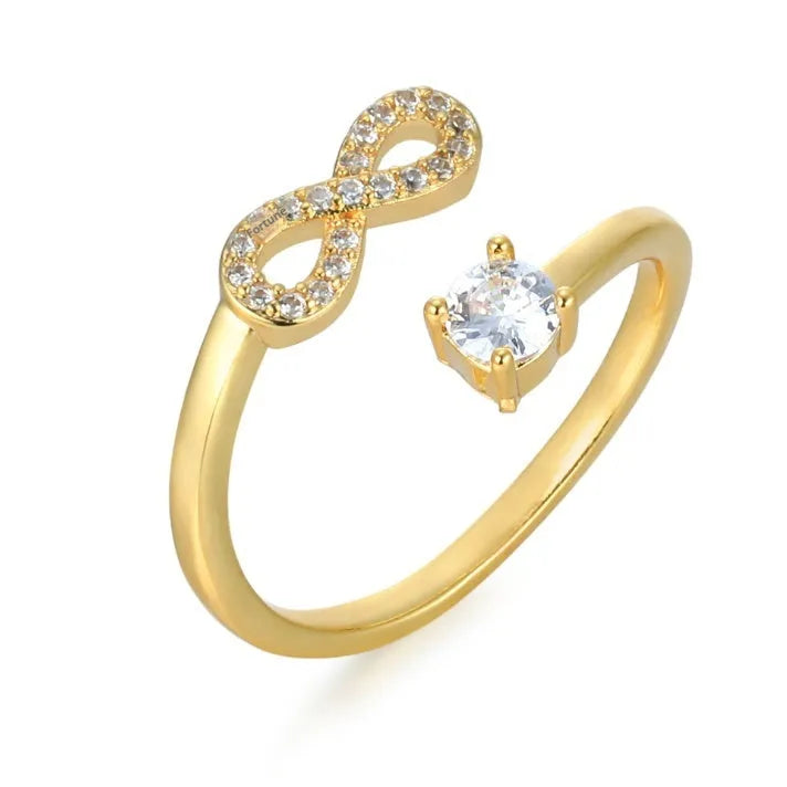 Open geometric alphabet ring with zircon inlay showing gold, rose gold and silver colour options
