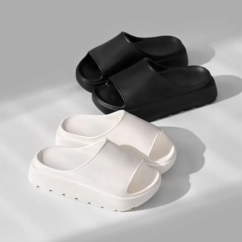 Women's beige thick-soled slippers with fish mouth pattern on 5.5cm EVA sole.