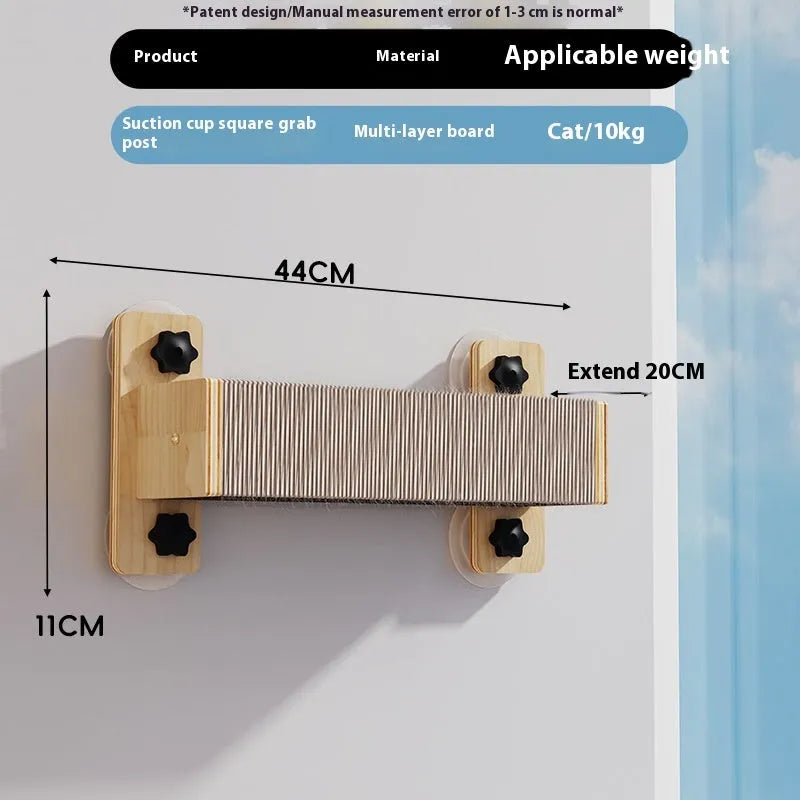 A space capsule style cat scratching post made of sisal with hanging rope lanyards.