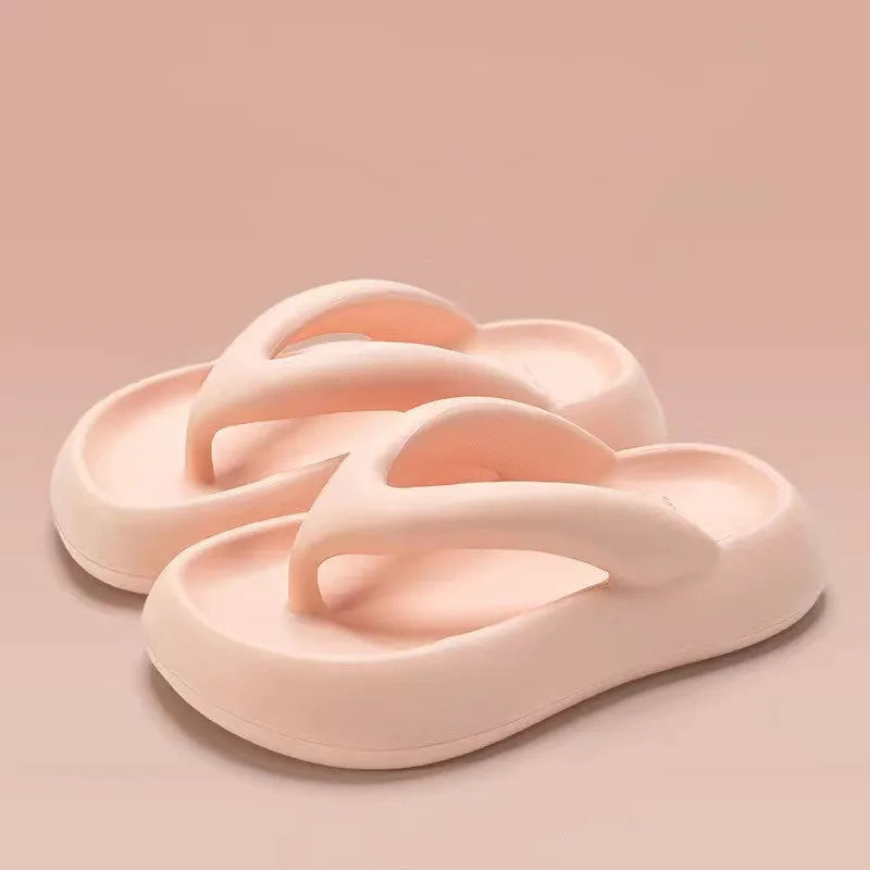 Solid colour thick-soled flip flops with decorative bow and injection moulded EVA construction