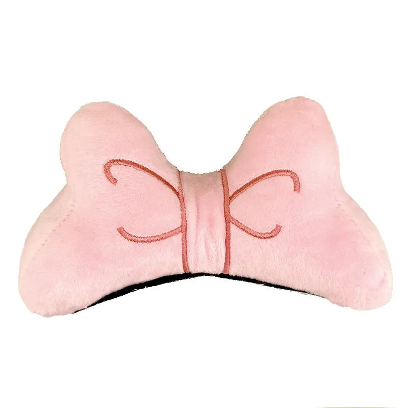 Soft plush bow tie helmet decoration for electric motorcycle and ski helmets in red, peach pink, and rose pink.