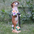 Straw hat mongoose garden ornament with synthetic resin construction for outdoor decoration