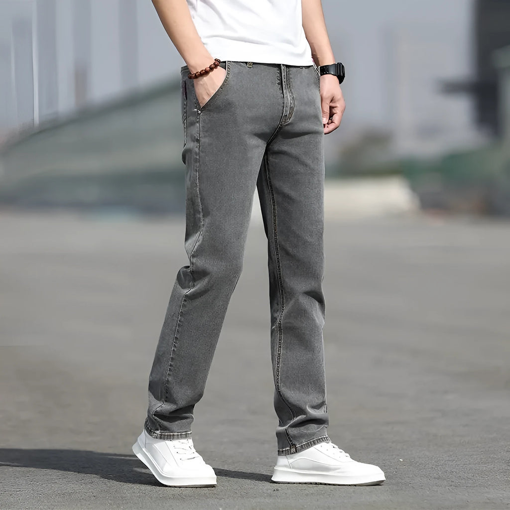 Men's smoky gray low-waist straight-leg jeans made from elastic rabbit fur fabric with a zip fly.