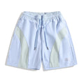 Men's quick-dry sports shorts in loose straight-leg cut with elastic waistband