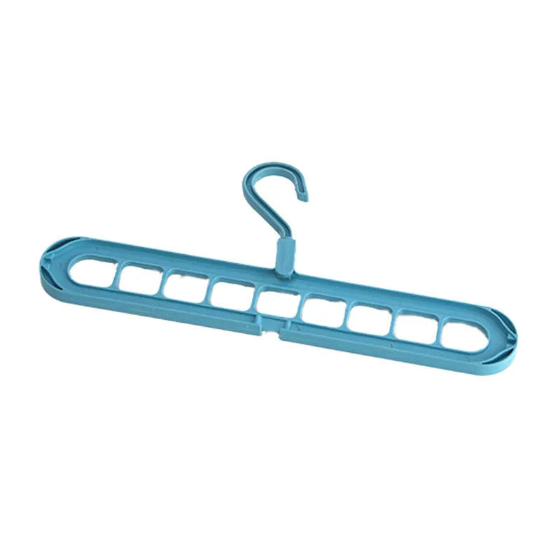 Green plastic nine-hole folding hanger for trousers displayed open and closed.