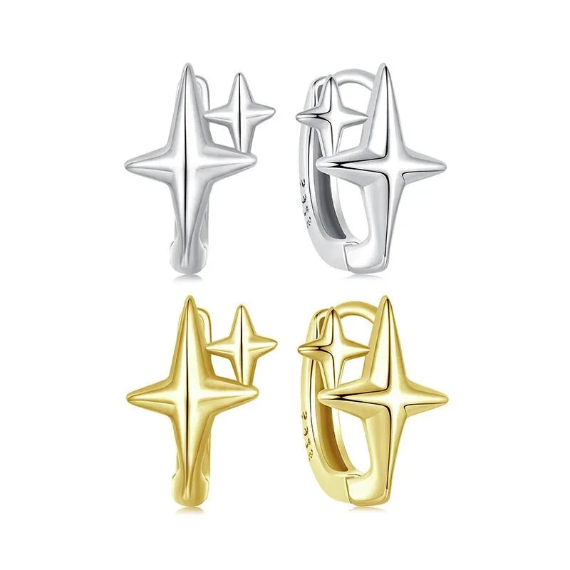 Minimalist sterling silver star ear clips with oxidised finish and ear clip design