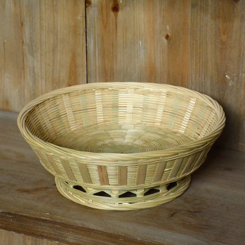 Handmade natural bamboo storage basket in woven construction showing three size options