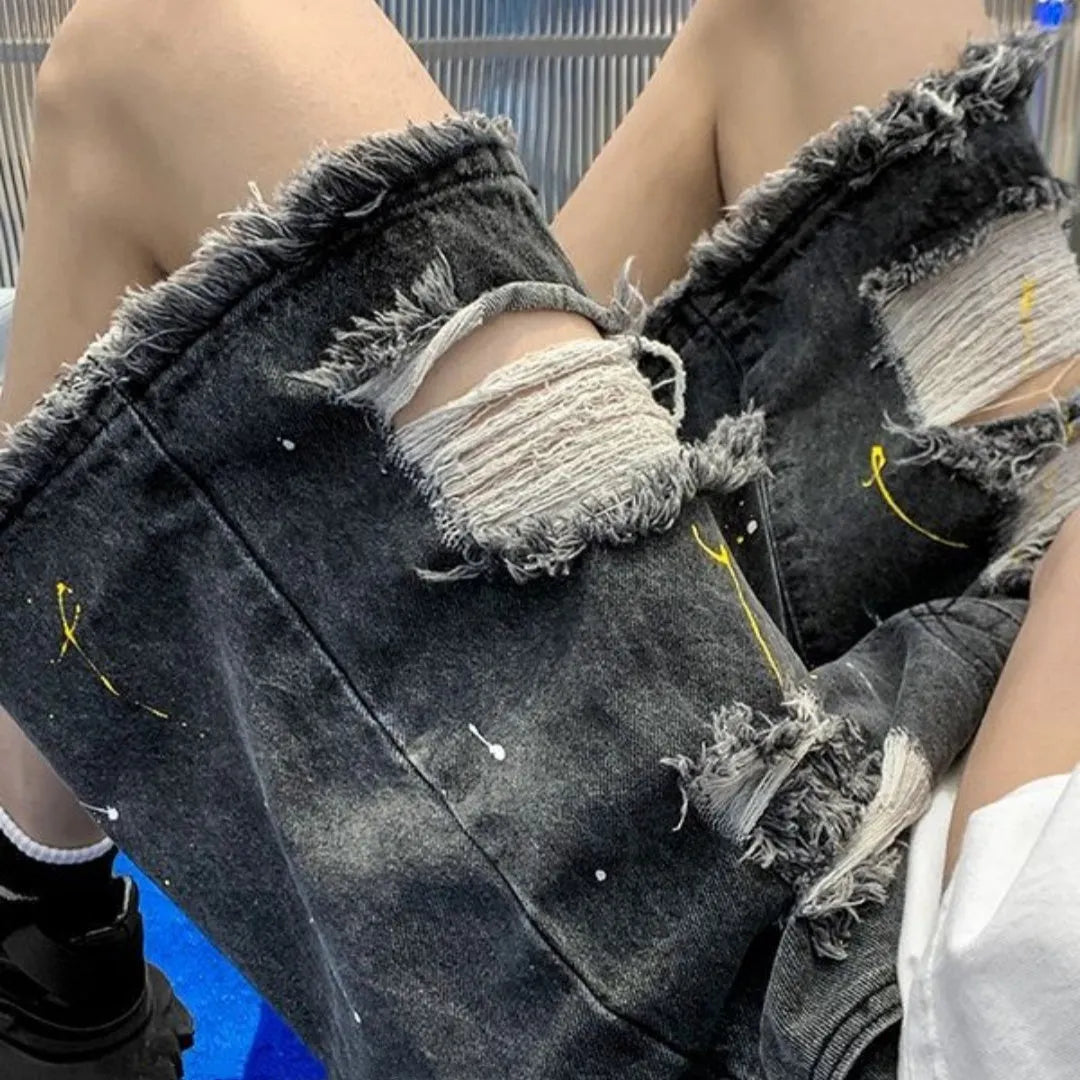 Men's loose fit light blue water washed denim shorts on a hanger.