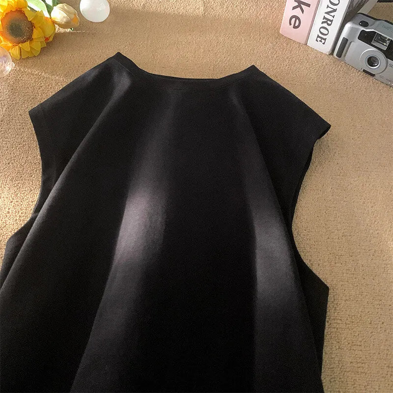 Men's solid colour loose fit cotton tank top on a hanger, showing straight hem and sleeveless design.