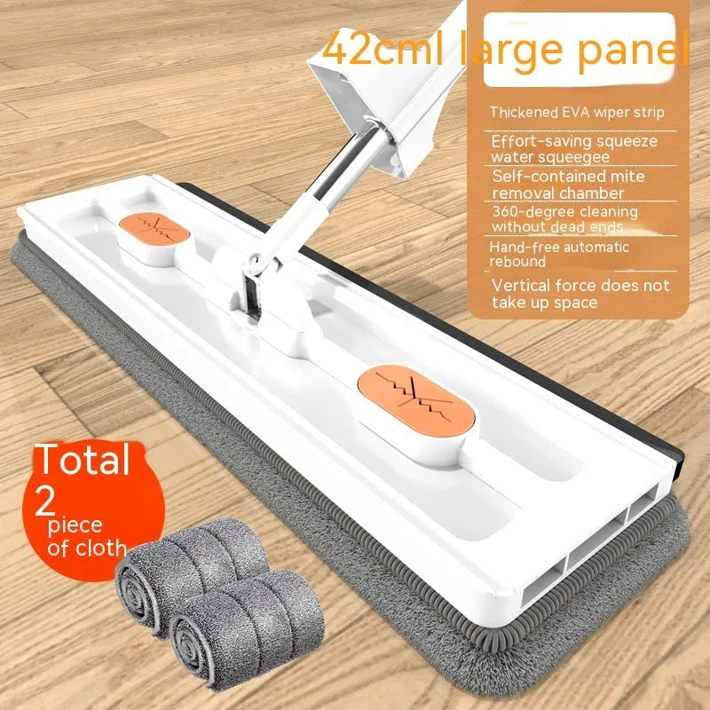 Large flat mop with long stainless steel handle and blue cleaning cloth on hard floor