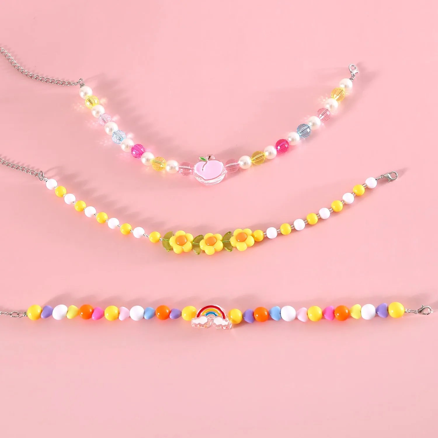 Colourful plastic pearl pet necklace with small flower, rainbow, or peach bead designs for cats