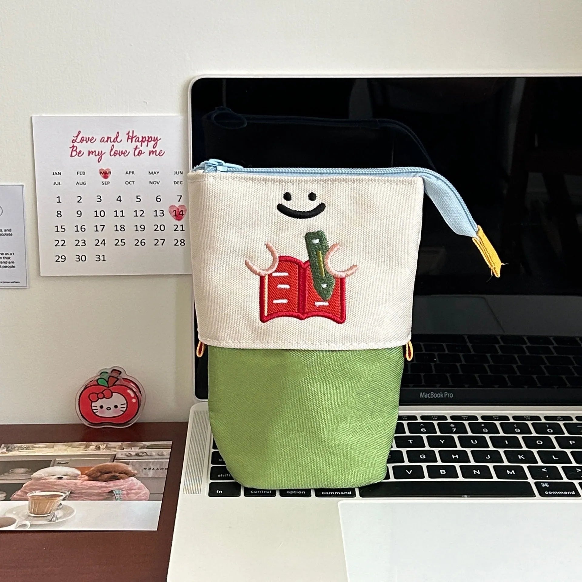 Brown Korean-style cartoon collapsible pencil case made from Oxford fabric, shown open.