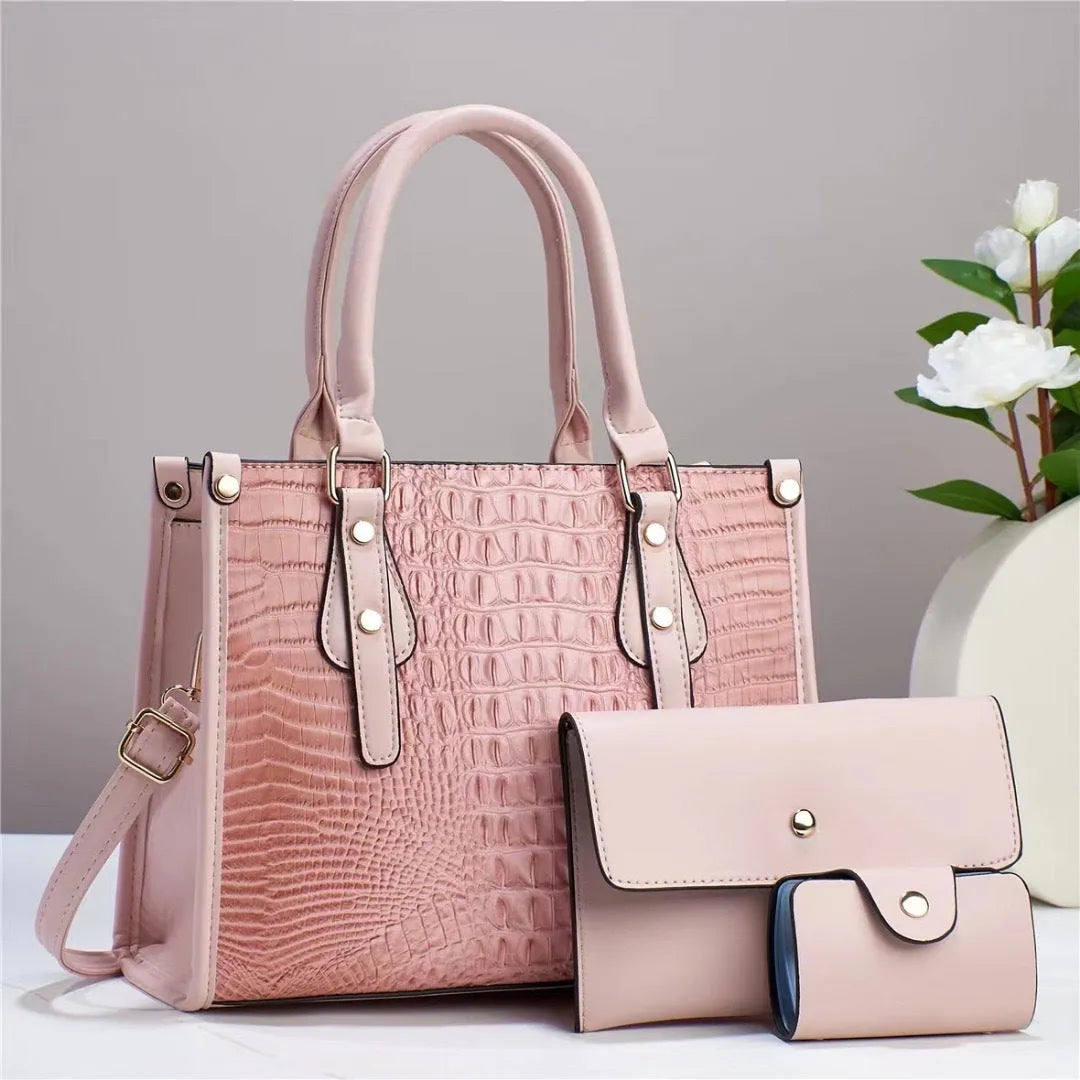 Three-piece PU bag set in chosen colour showing bucket crossbody bag, matching wallet, and card holder.