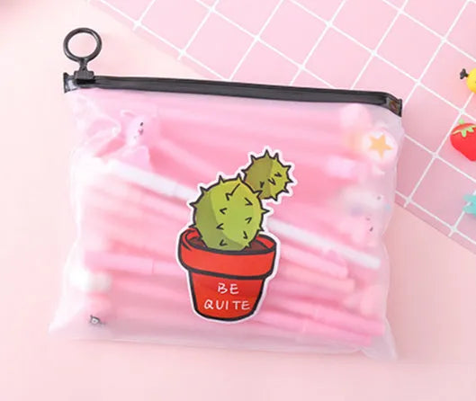 Set of twenty 0.5mm black pens with cactus cartoon designs inside a matching plastic pen case.