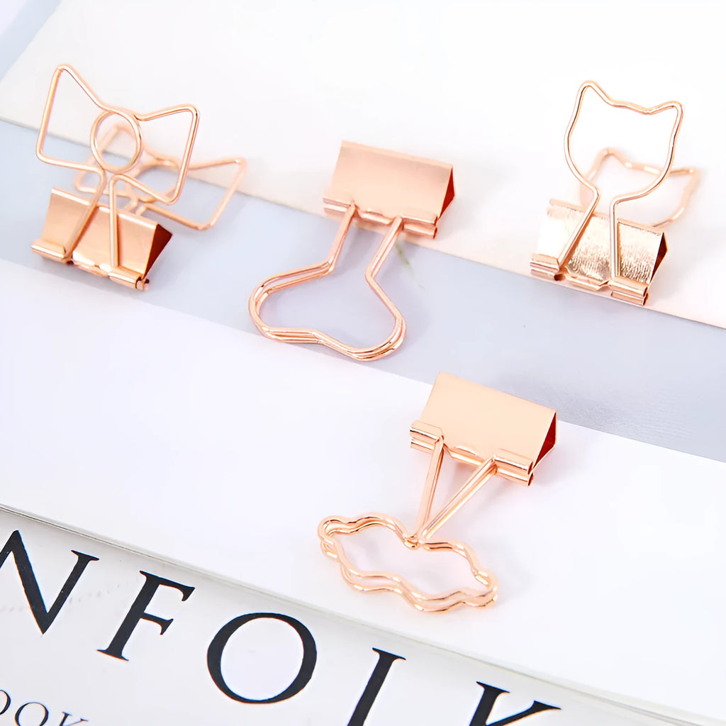 Gold-plated long-tail metal clip with a choice of bow, cactus, cat, flamingo, love, or cloud decorative design.