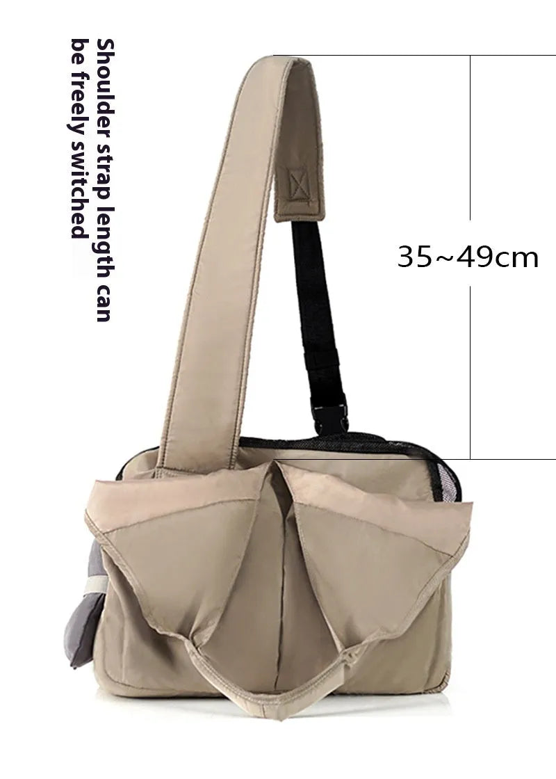 Apricot coloured cloth pet handbag for outdoor summer use.