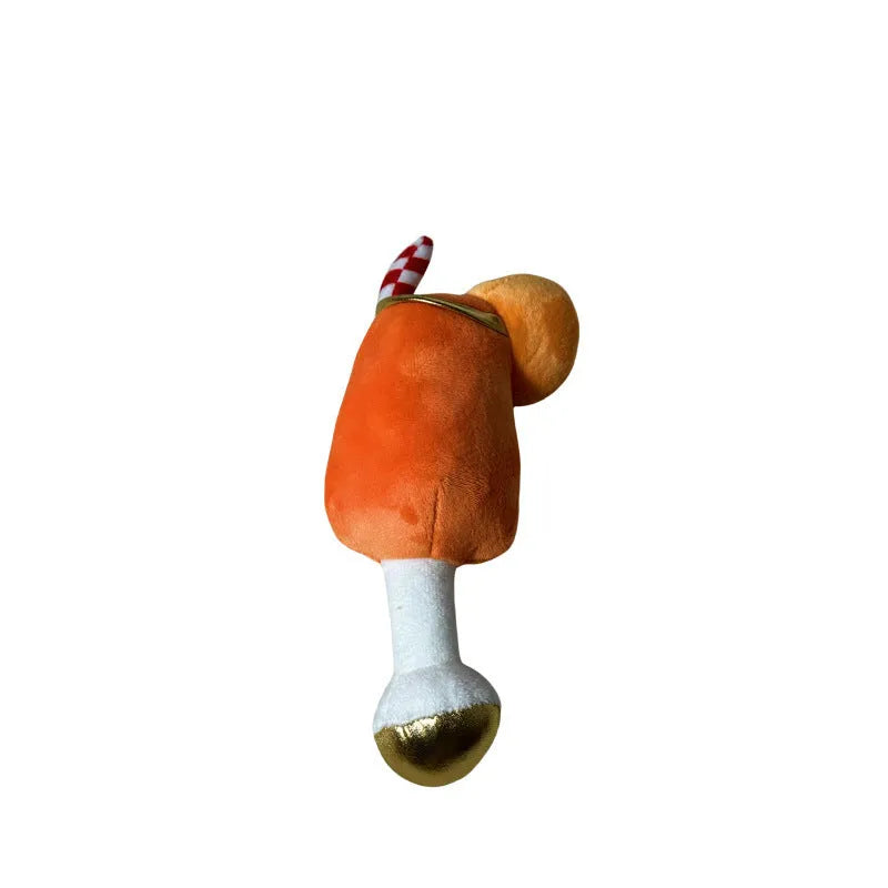 Yellow plush squeaky dog toy shaped like a beer bottle cup with textured surface