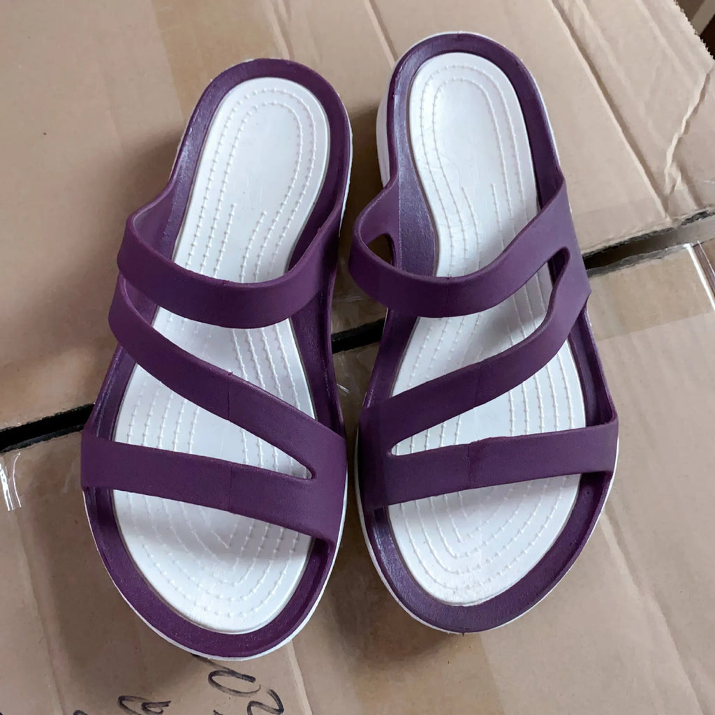 A pair of solid-colour women's casual sandals with a breathable PP upper, shown in one of six available colours.