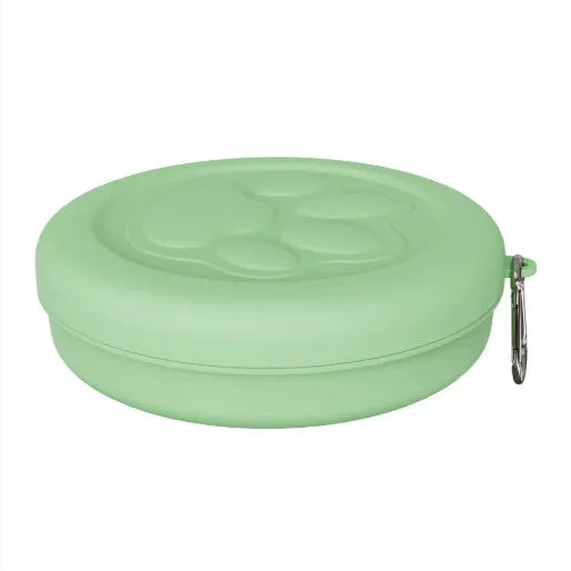 Portable dog food bowl with snack box compartment in light pink and light green colours