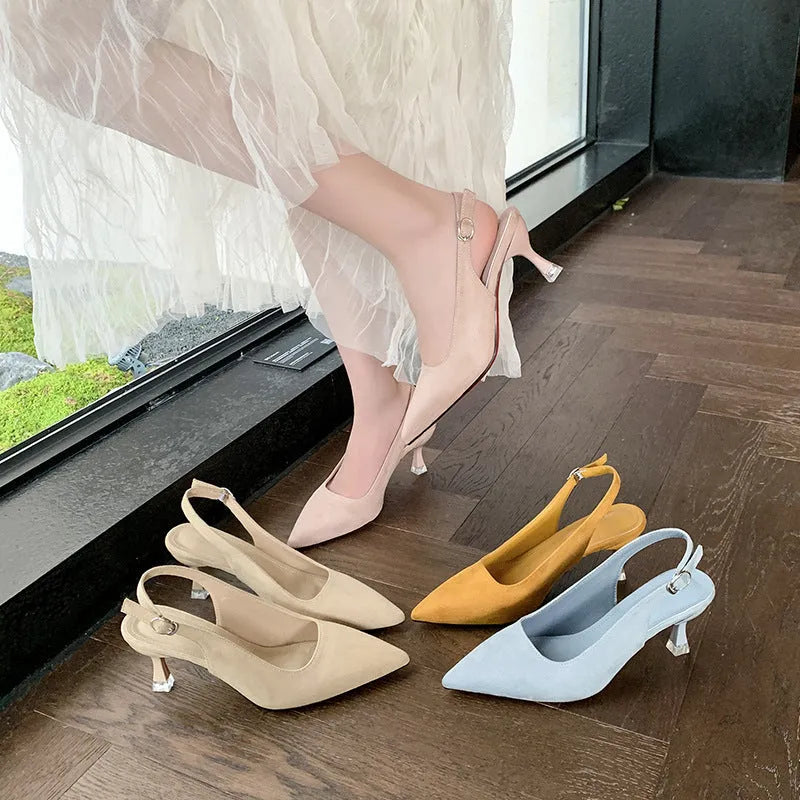 Pointed toe stiletto high heel shoe in suede with a rubber sole.