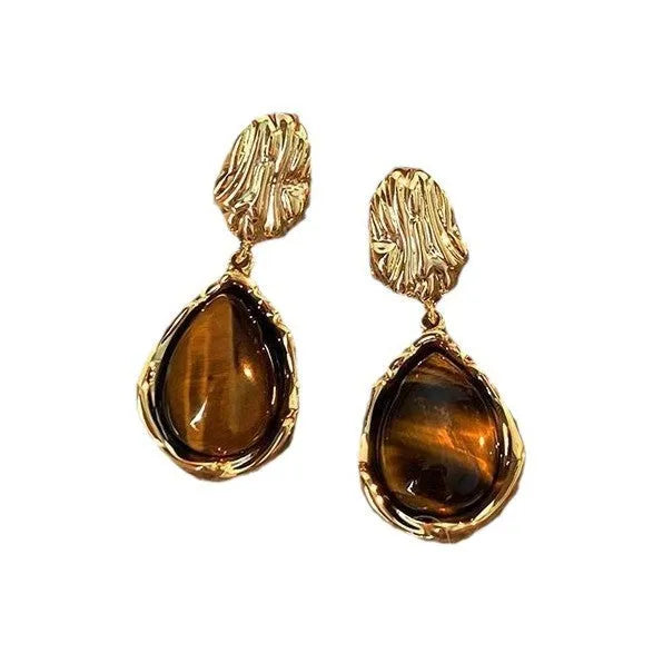 Three pairs of handmade geometric women's earrings with electroplated finishes and tassel details
