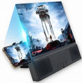 Universal mobile phone screen amplifier with 12-inch acrylic lens and ABS housing on a table.