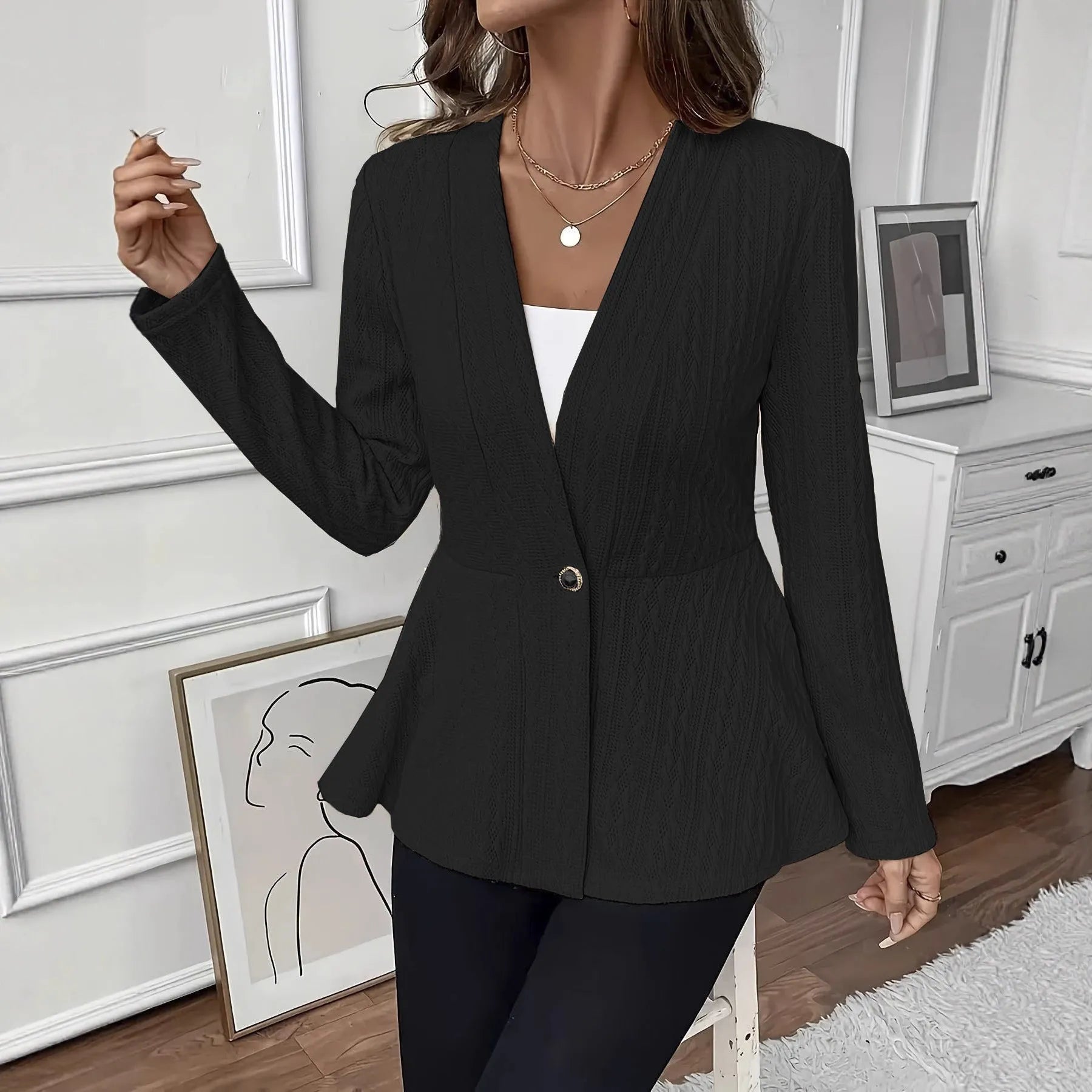 Women's apricot slim fit knitted cardigan with one button and jacquard pattern texture.
