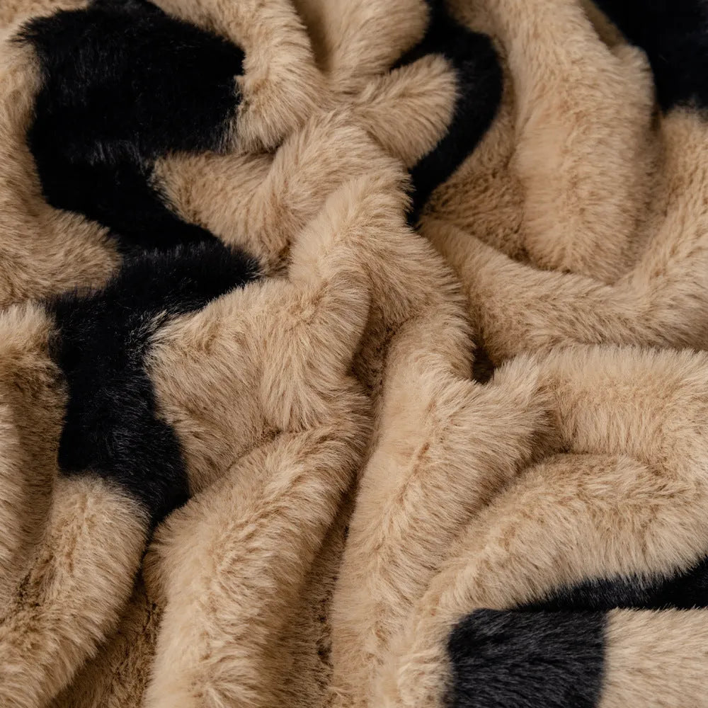 Zebra pattern flannel sofa cover with non-slip design on furniture