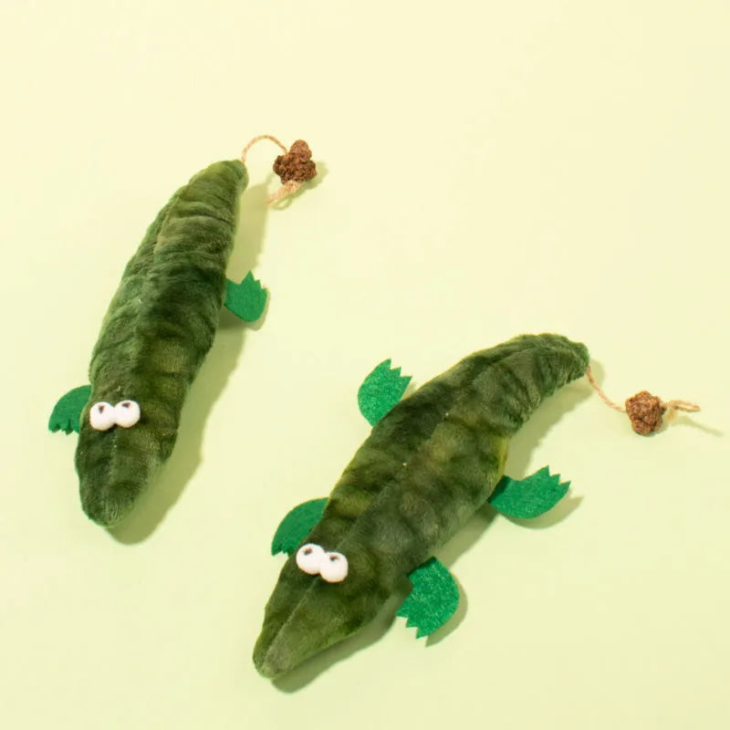 Green plush alligator cat toy with catnip and peppermint scent for dental care