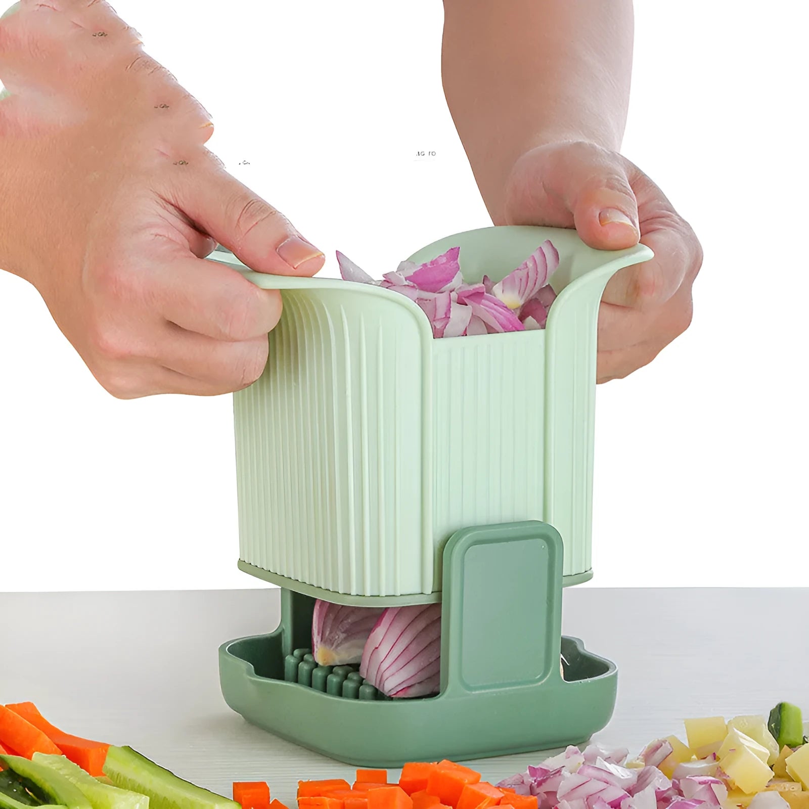Green multifunctional vegetable chopper with hand pressure mechanism and stainless steel blade for slicing onions and potatoes