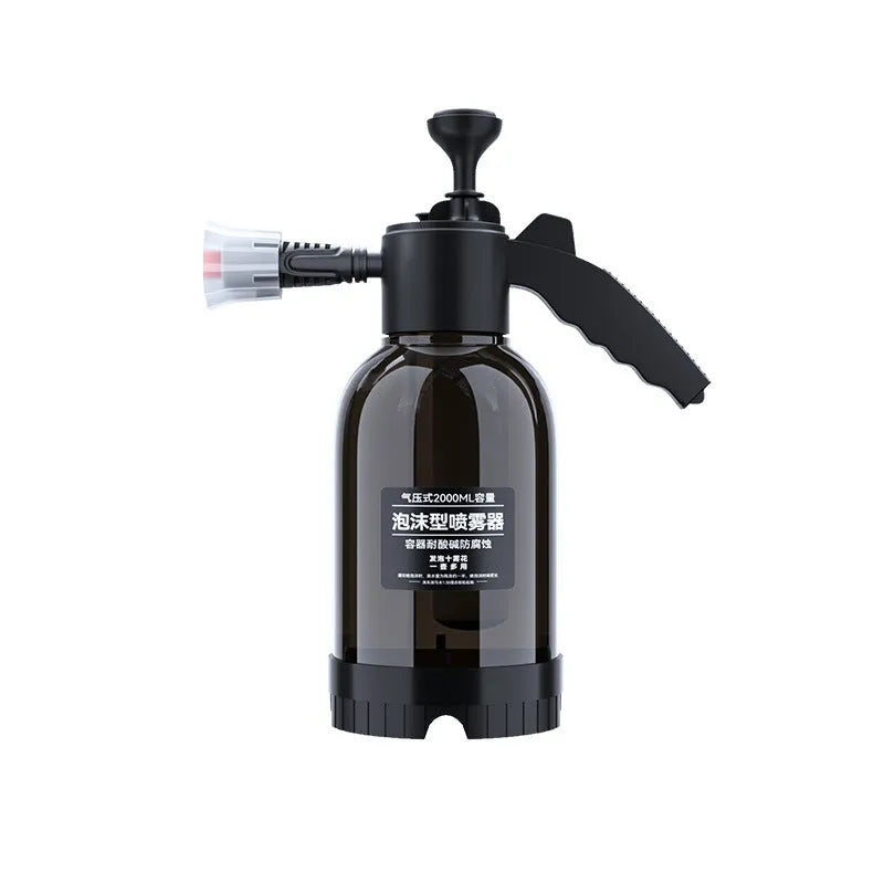Black hand-held sprayer bottle with ergonomic handle and two nozzles for garden watering and car washing