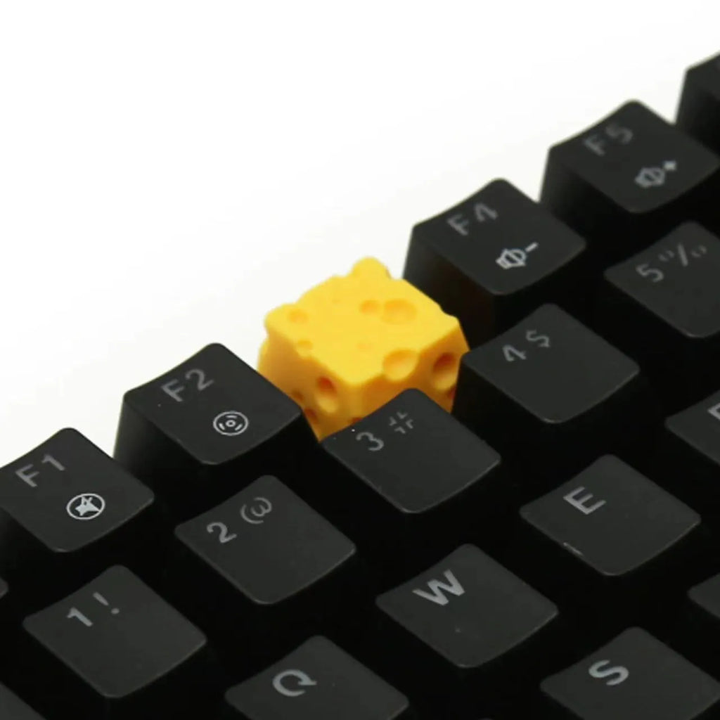 Yellow resin cheese character keycap for mechanical keyboards with Cherry MX compatibility