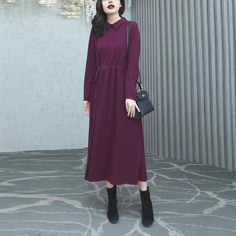 Purplish red plus size dress with extra long sleeves and long skirt for winter wear