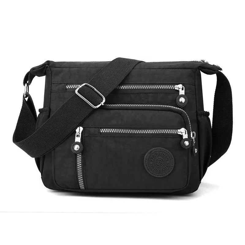Nylon messenger bag in grey colour with single shoulder strap and square vertical design