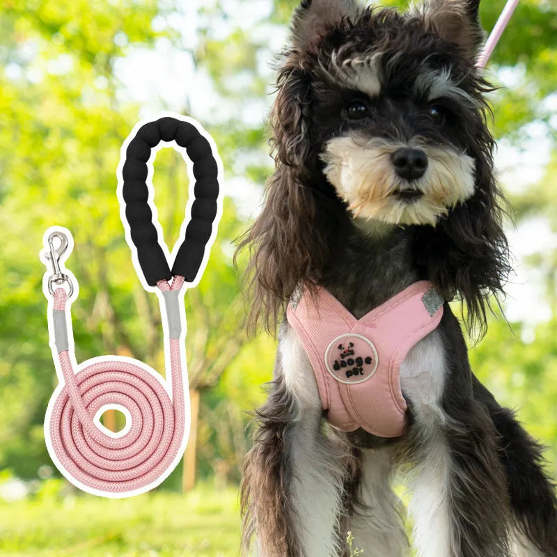 Polyester dog vest and matching hand holding rope in a choice of blue, green, pink, or yellow.