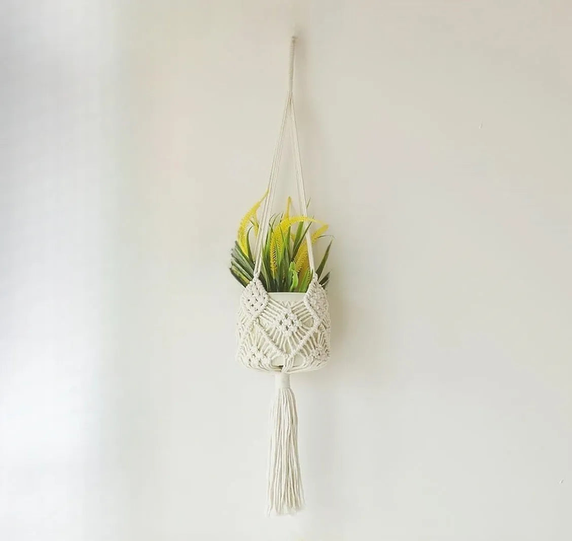 Hand-woven brown polyester cotton flower pot cover with a net pocket on the side.