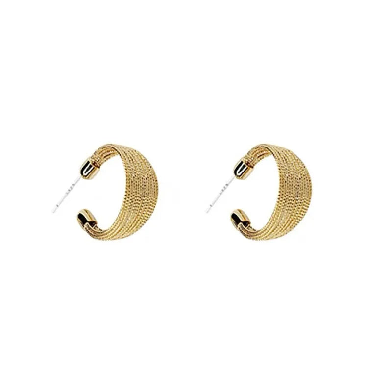 Geometric copper earrings with electroplated silver and gold finishes, including stud and clip-on options