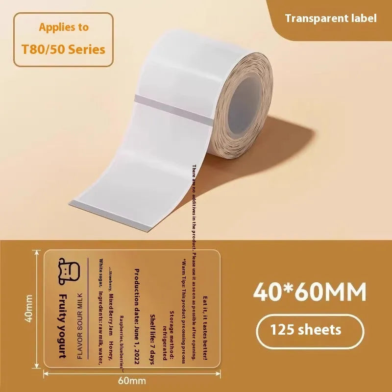 Roll of transparent waterproof adhesive labels showing rectangular and round sizes on thermal synthetic paper.