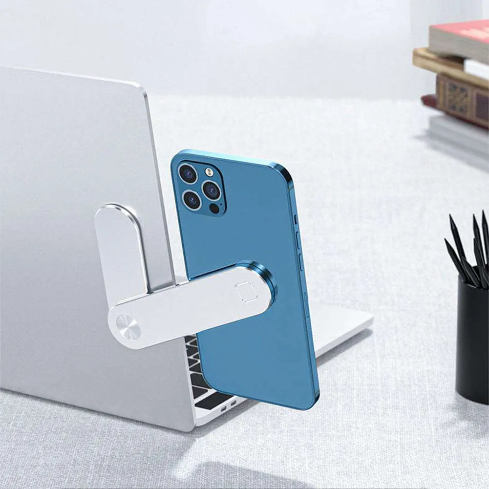 Black aluminum laptop phone holder with magnetic mount attached to computer monitor