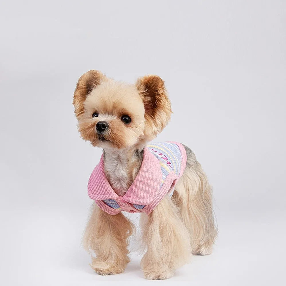 Pink purple sleeveless dog vest with a knitted turtleneck collar laid flat.