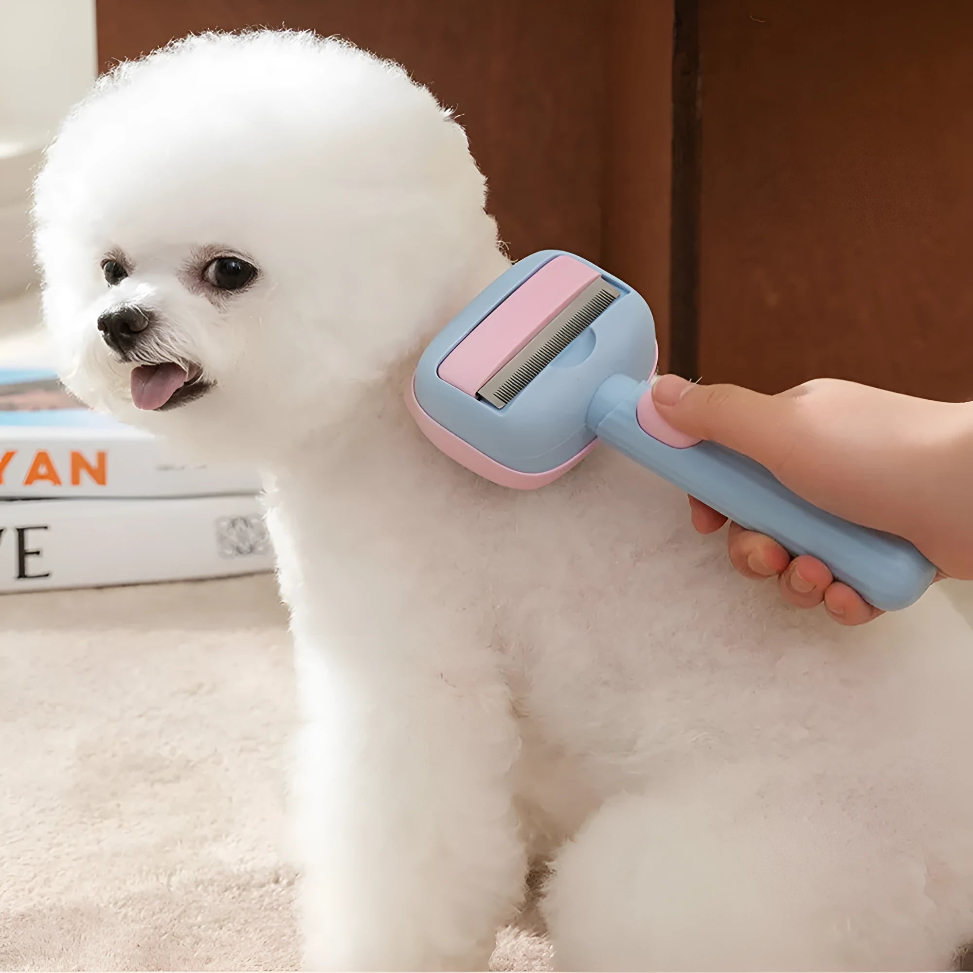 Blue dual-sided deshedding brush and dematting comb for large dogs and cats on a white background.