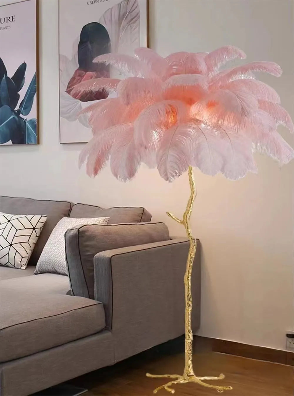 Tall decorative floor lamp with cluster of white resin feathers, standing 170cm high in a living room.