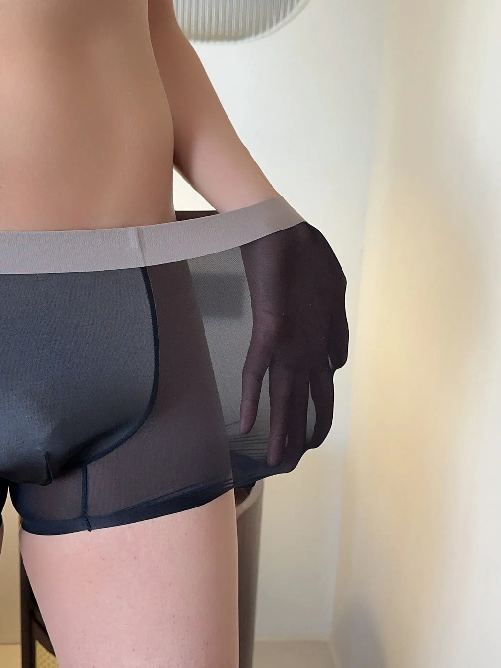 Seamless men's boxer shorts in ultra-thin honeycomb fabric, shown in a nude colour.