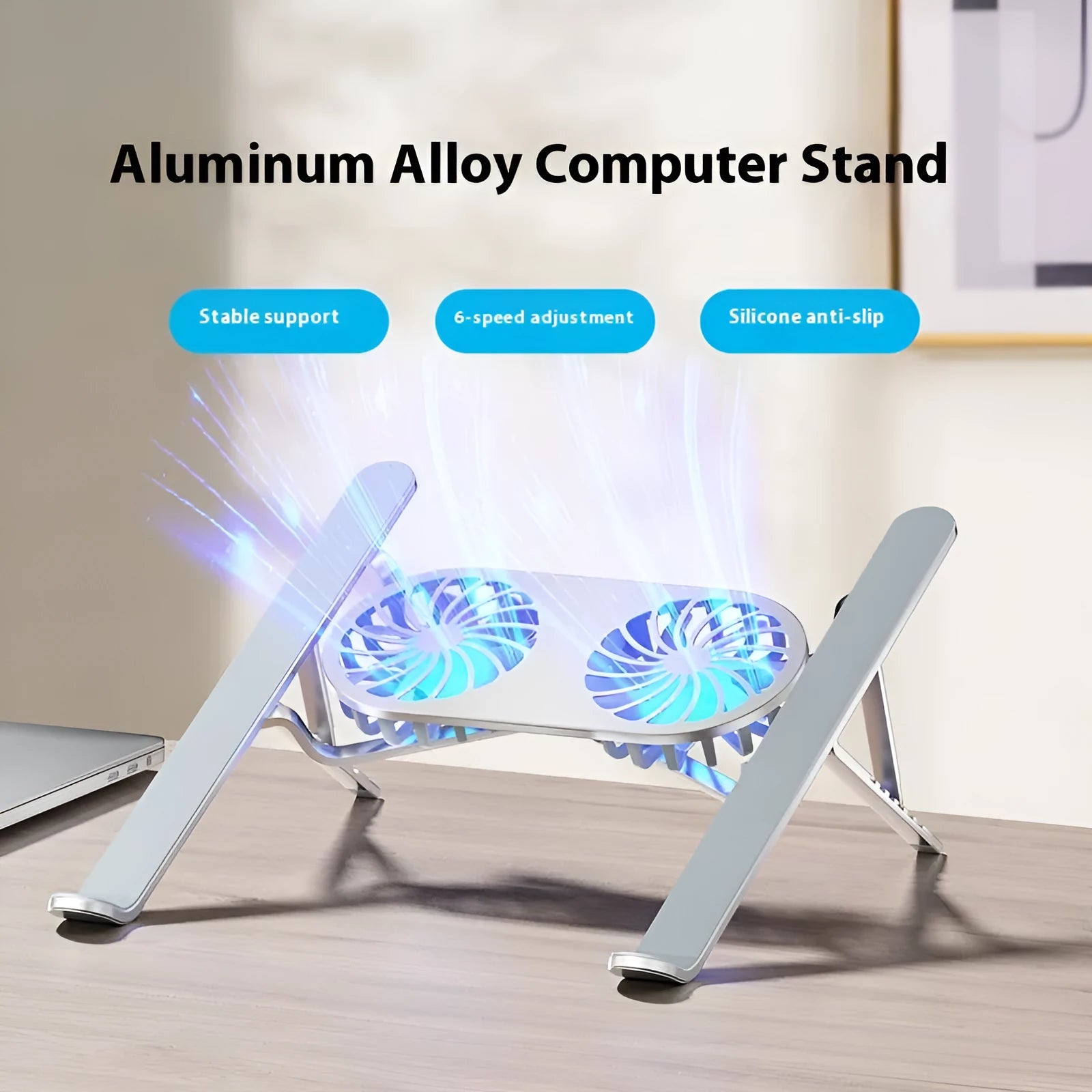 Silver aluminium laptop cooling stand with twin fans and height adjustment, shown folded.