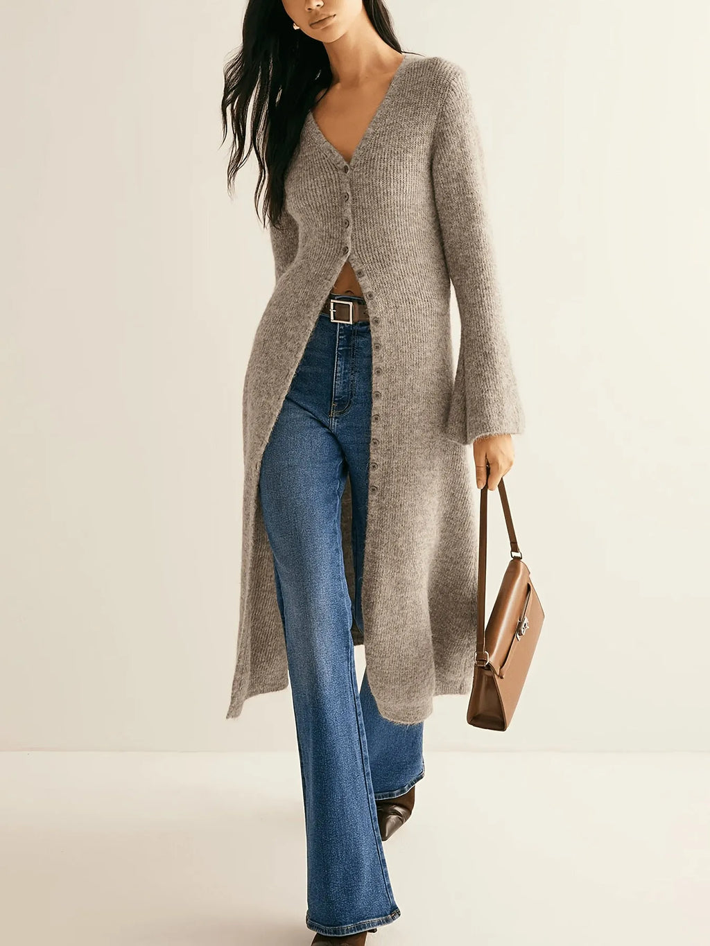 Khaki coloured women's long sleeve button-front cardigan coat in a French retro style.