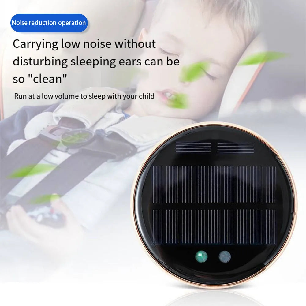 Black solar-powered car air humidifier mounted in a vehicle air conditioning vent