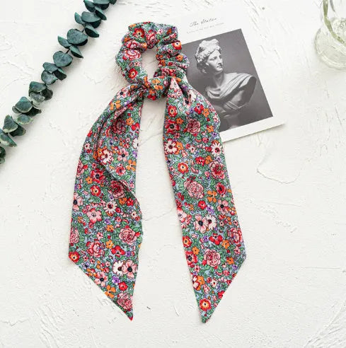 Long cloth ribbon hair tie with large intestine ring design in spring dark green colour
